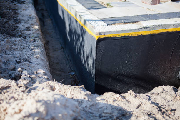 Professional Waterproofing technician working in Cropwell, AL